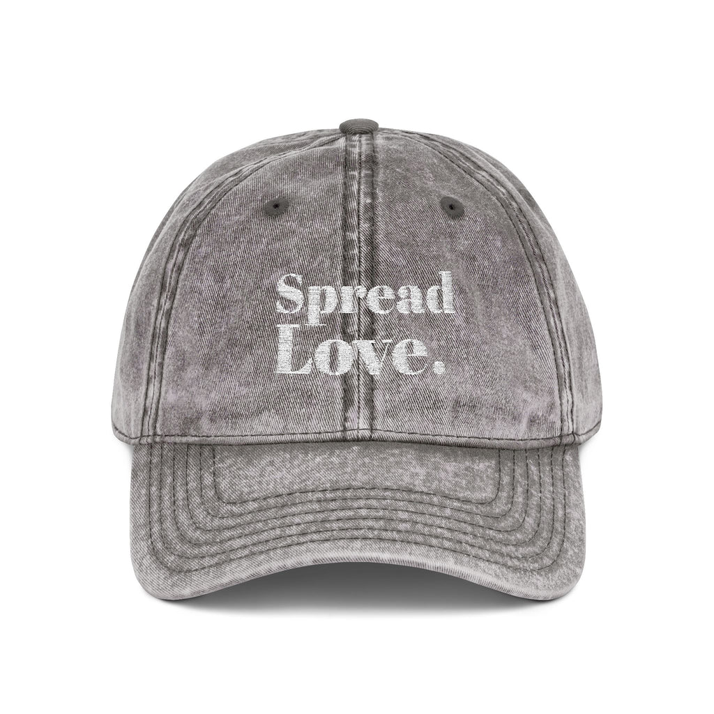 Minimal washed grey dad cap with premium white "Spread Love." embroidery on the front. A timeless streetwear essential made for everyday comfort, positivity, and effortless style.