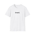 White oversized graphic tee featuring a minimalist "trust." chest print and a Renaissance-inspired artwork on the back. A premium aesthetic streetwear piece blending timeless art, self-expression, and modern minimal fashion.